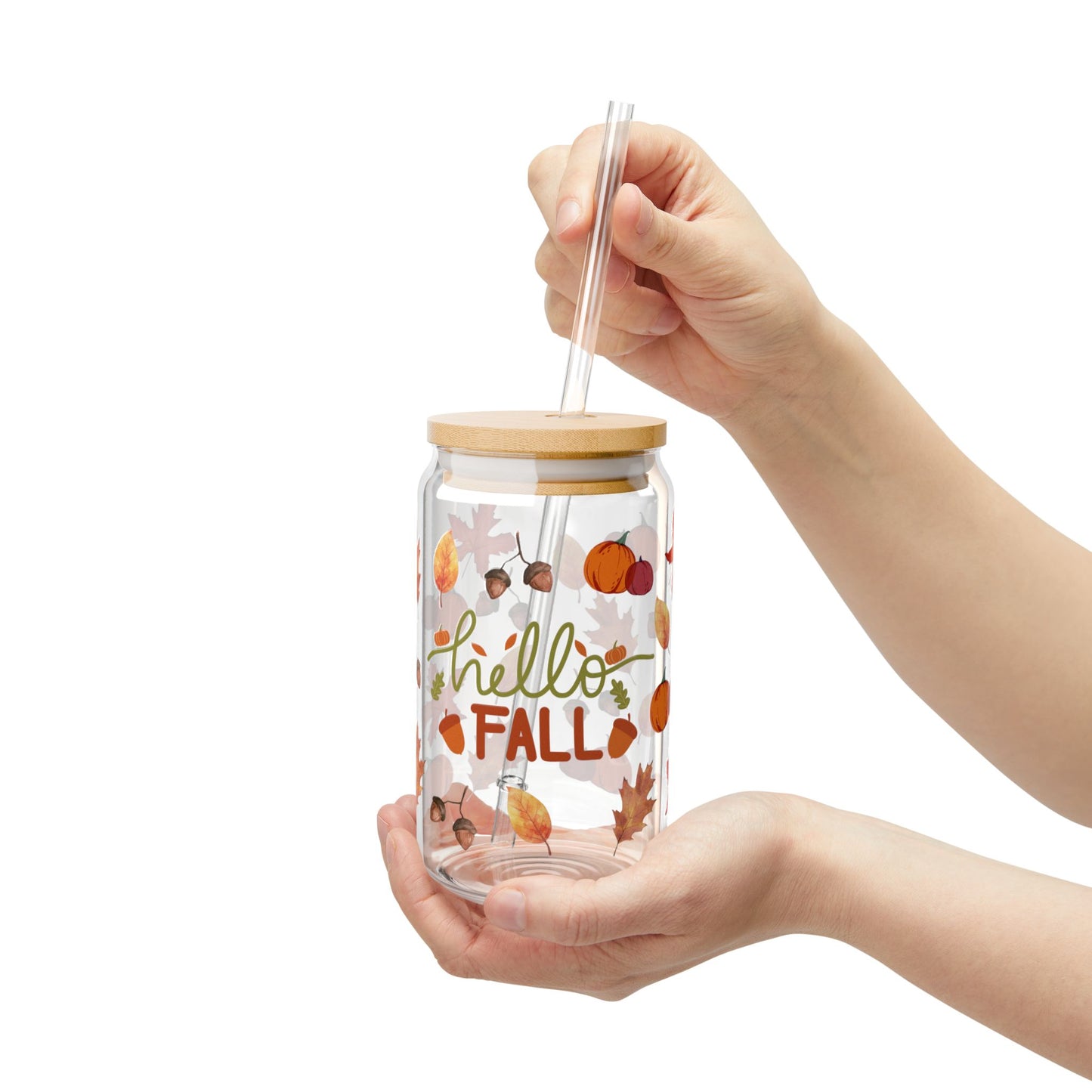 Woman holding fall season sipper glass – reusable autumn drinkware