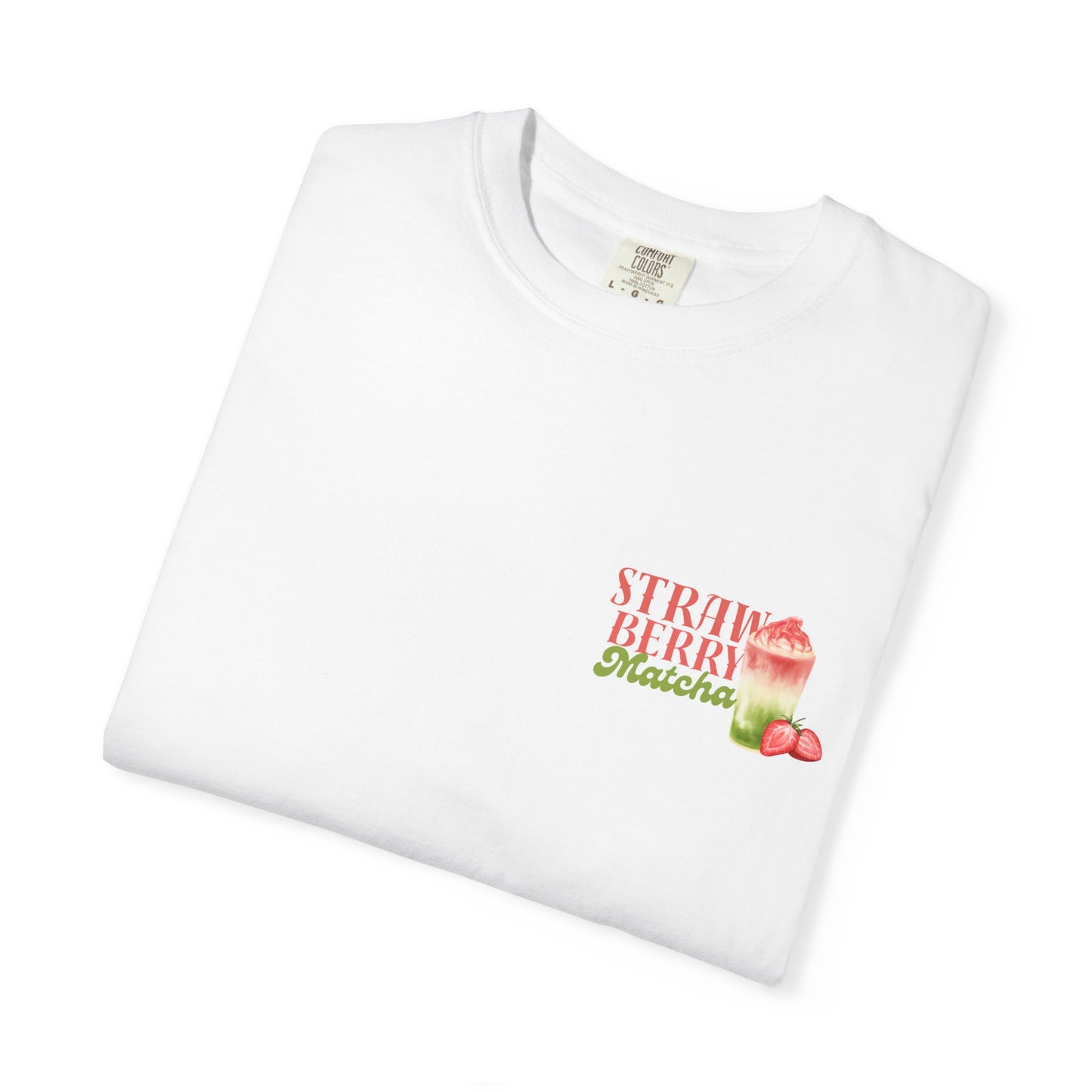 Folded white Strawberry Matcha T-Shirt – bold fruity graphic design