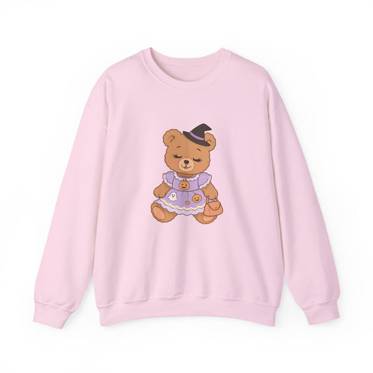 Pink sweatshirt with a teddy bear graphic on a white background