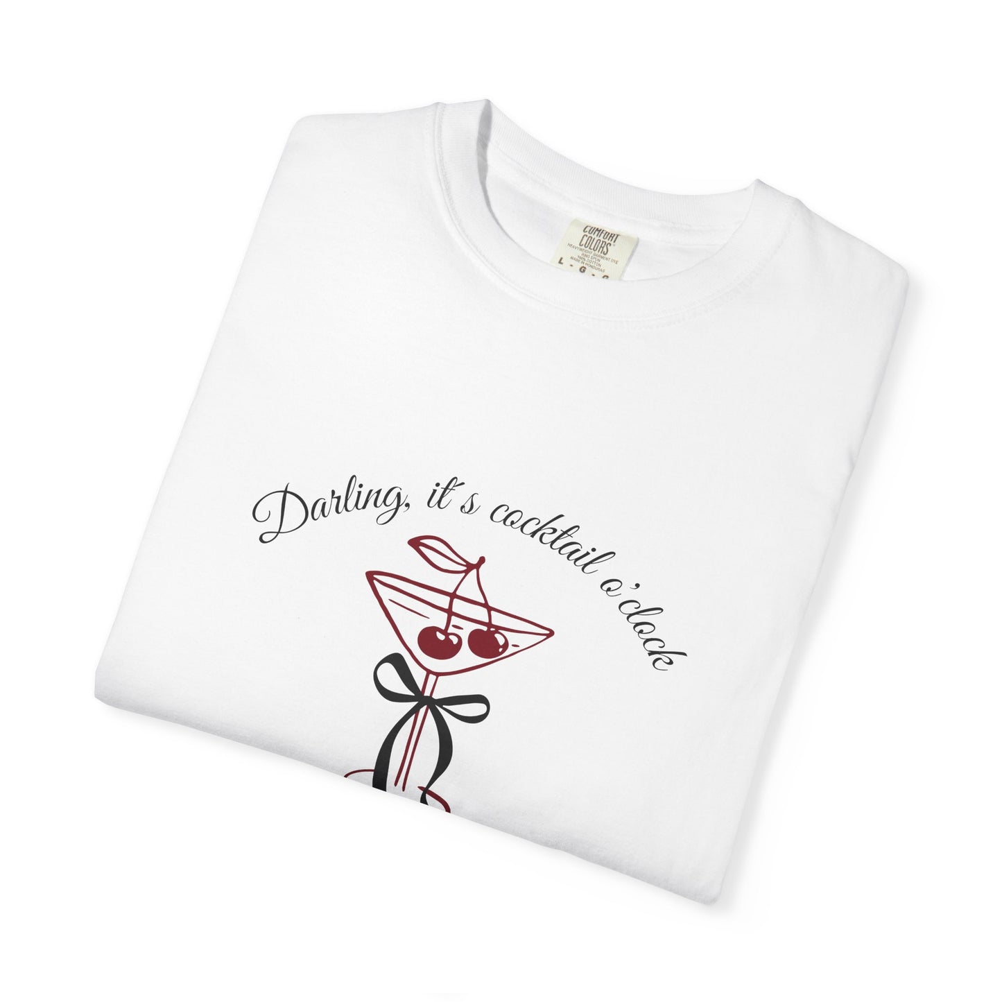 White folded t-shirt with cocktail graphic and text on a white background