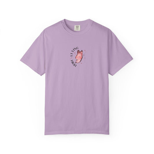 Purple cotton t-shirt with butterfly design, whimsical fashion style.
