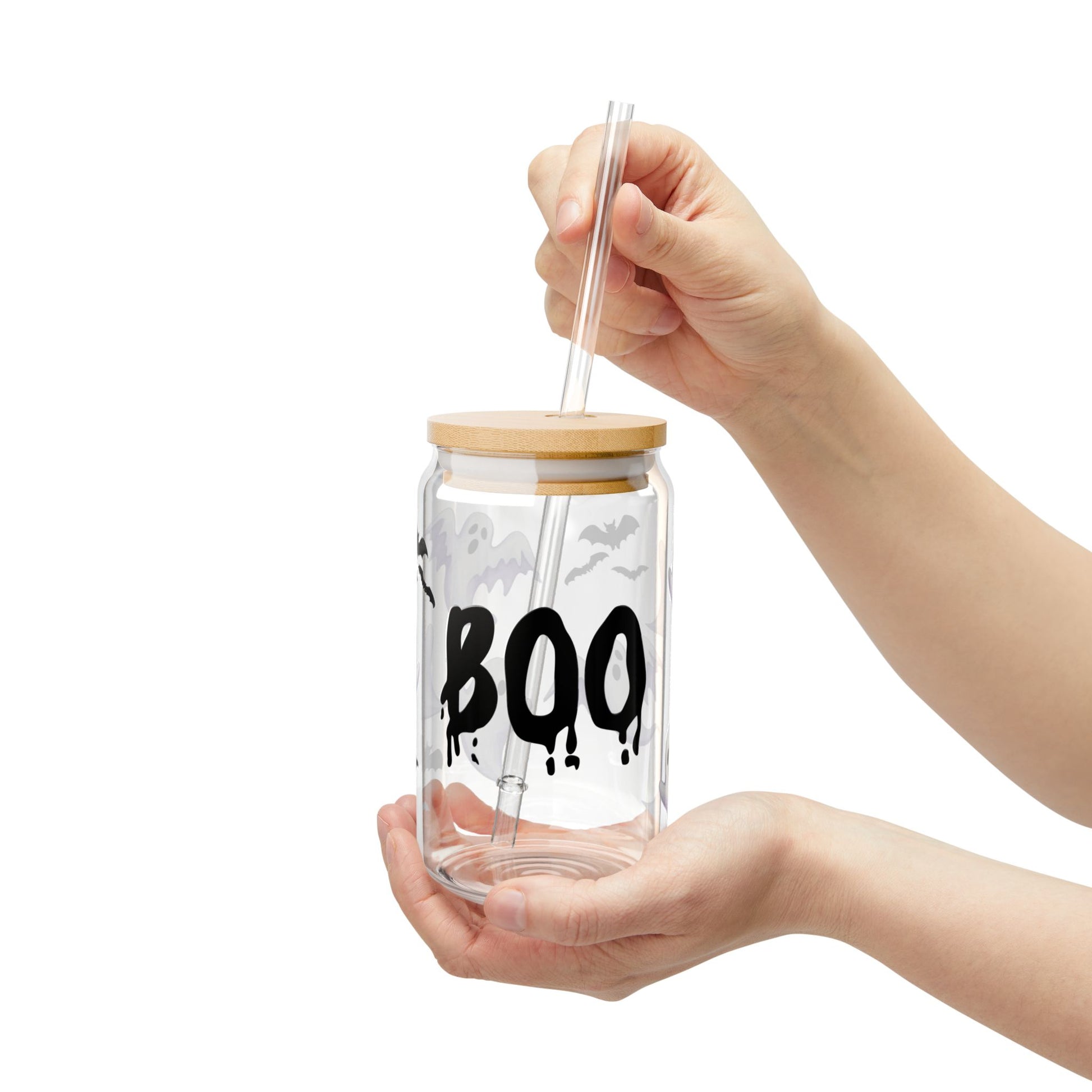 Woman holding Halloween sipper glass – eco-friendly autumn drinkware