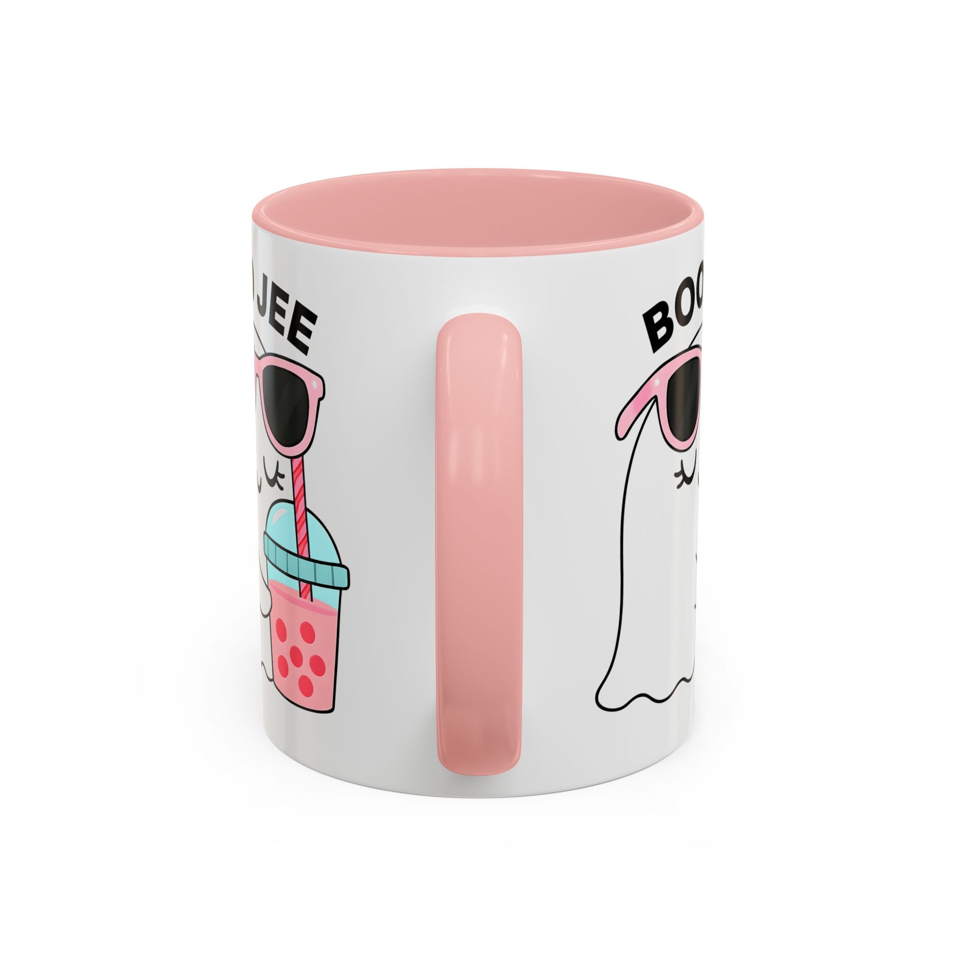 White mug with pink interior and handle, featuring a cartoon character and text on a white background