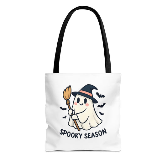 Tote bag with a ghost holding a broom and 'Spooky Season' text on a white background - black handles