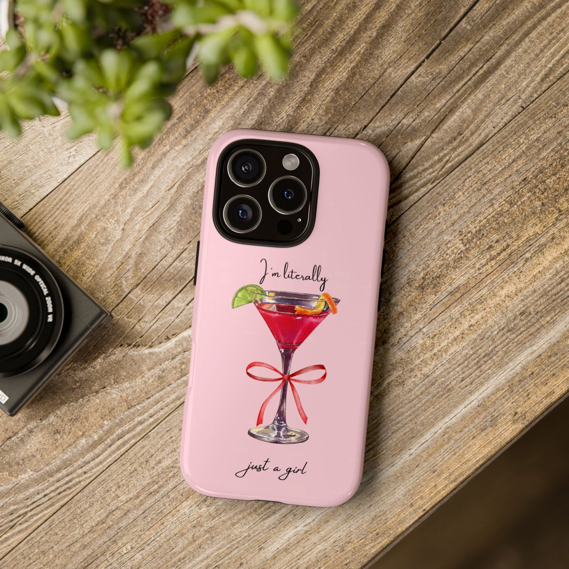 Trendy pink aesthetic phone case with “I’m literally just a girl” design, shown in use.